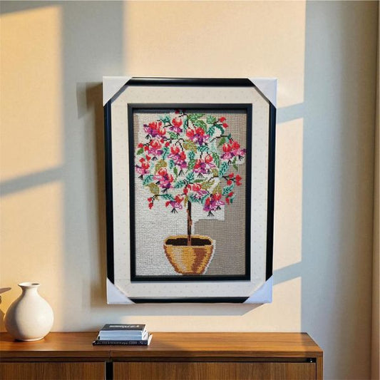 Painting - Framed cross-stitched artwork of a floral tree for home decor.